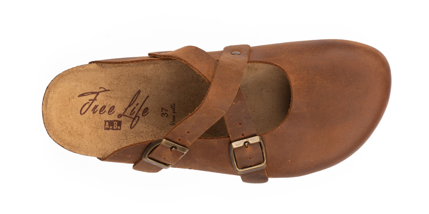 Women's closed leather sabot with crossed straps